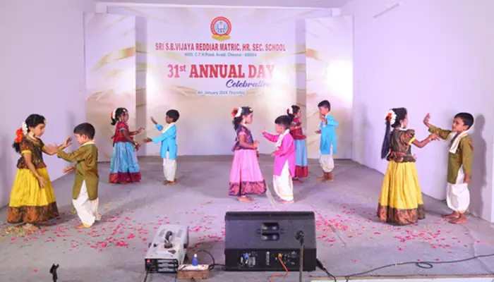 Students performing a cultural program in the multipurpose hall, actively participating in learning.