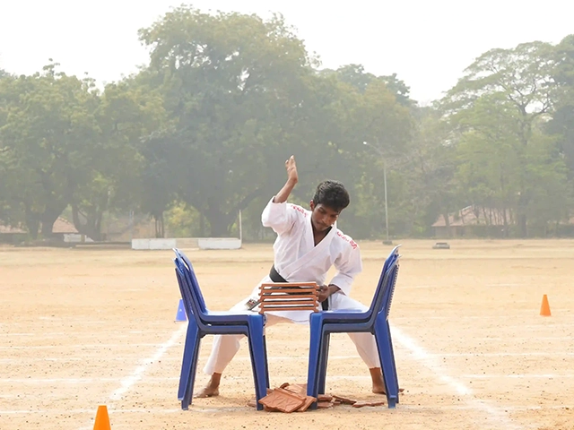 School students actively perform karate demonstrations as part of annual sports celebrations Avadi.