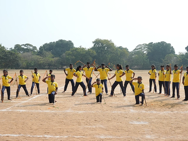 Students perform traditional Silambam art skillfully during the school playground cultural activities