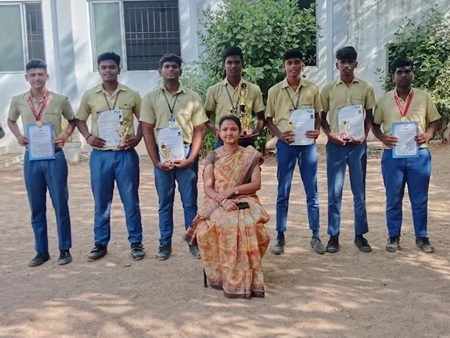 SBVR School students proudly holding certificates with their teacher after achievement, Avadi.