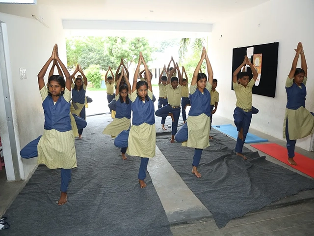 SBVR School students practicing yoga outdoors to promote health, focus, and overall well-being.