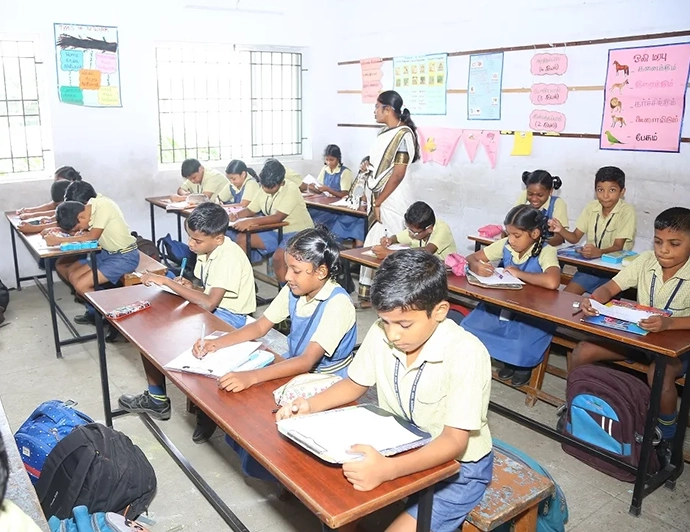 Students actively participating in classroom learning activities, fostering academic growth